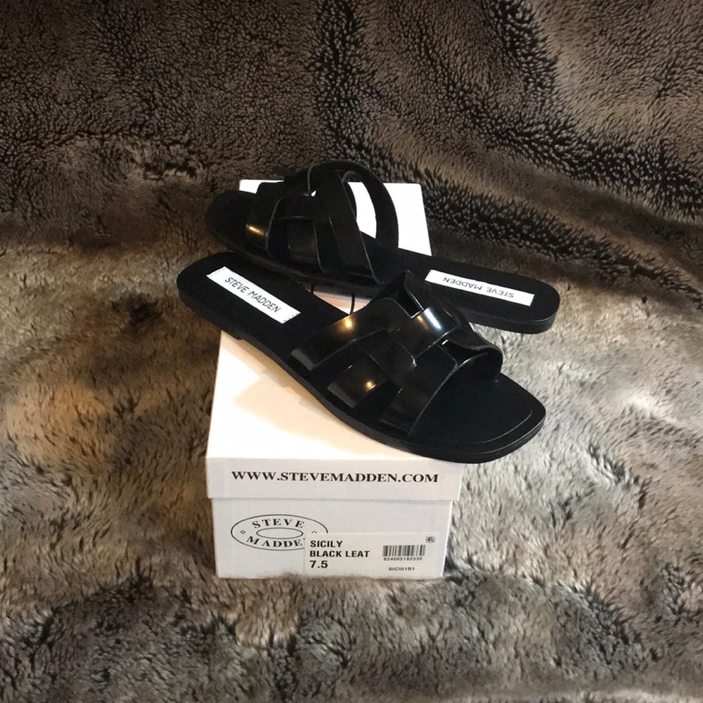Steve Madden Sicily black leather slide sandals.